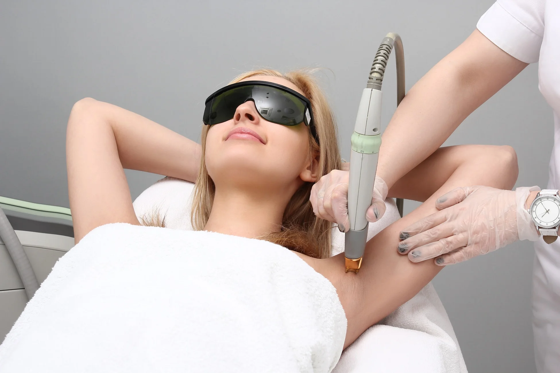 Woman is receiving laser hair removal treatment in San Francisco, CA | Selfishly Wellness