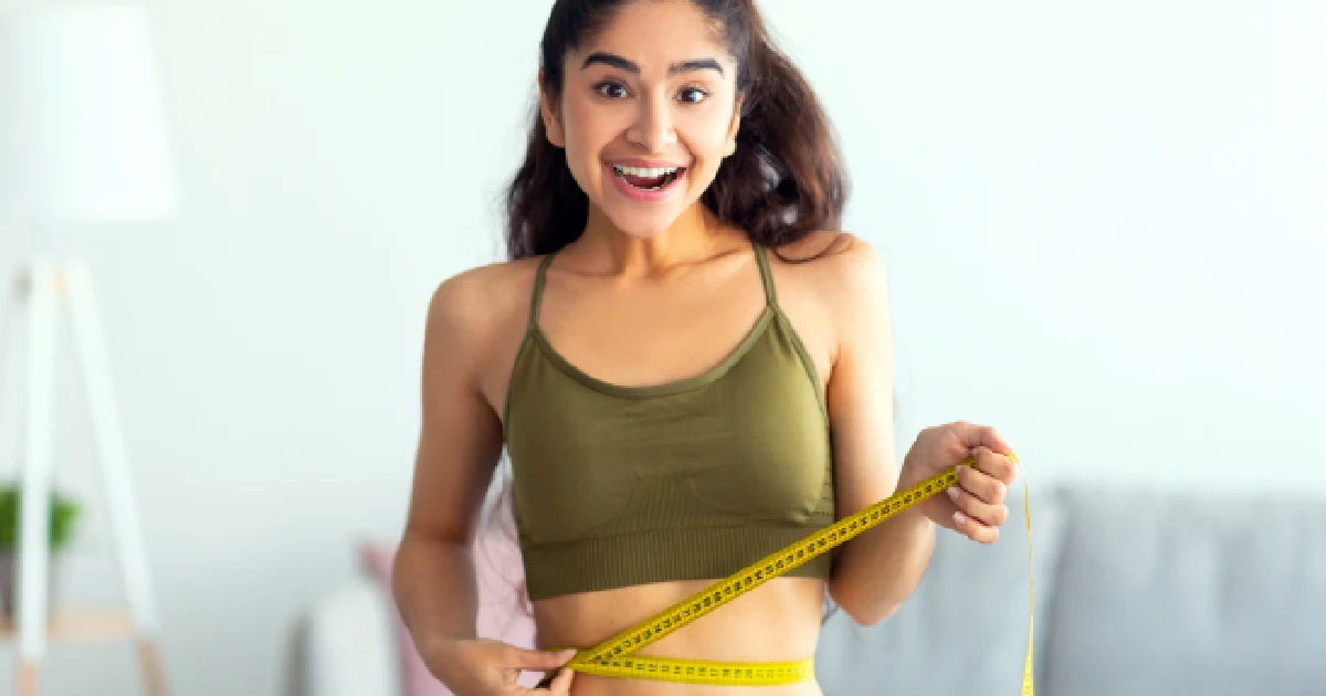 Smiling woman representing success in Weight Loss Management in San Francisco, CA
